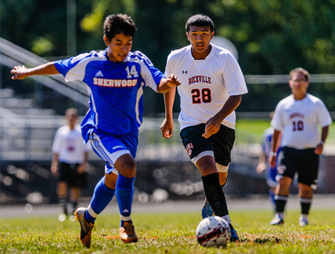 students playing soccer