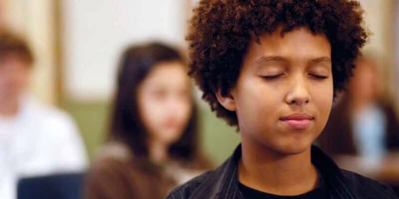 child practicing mindfulness