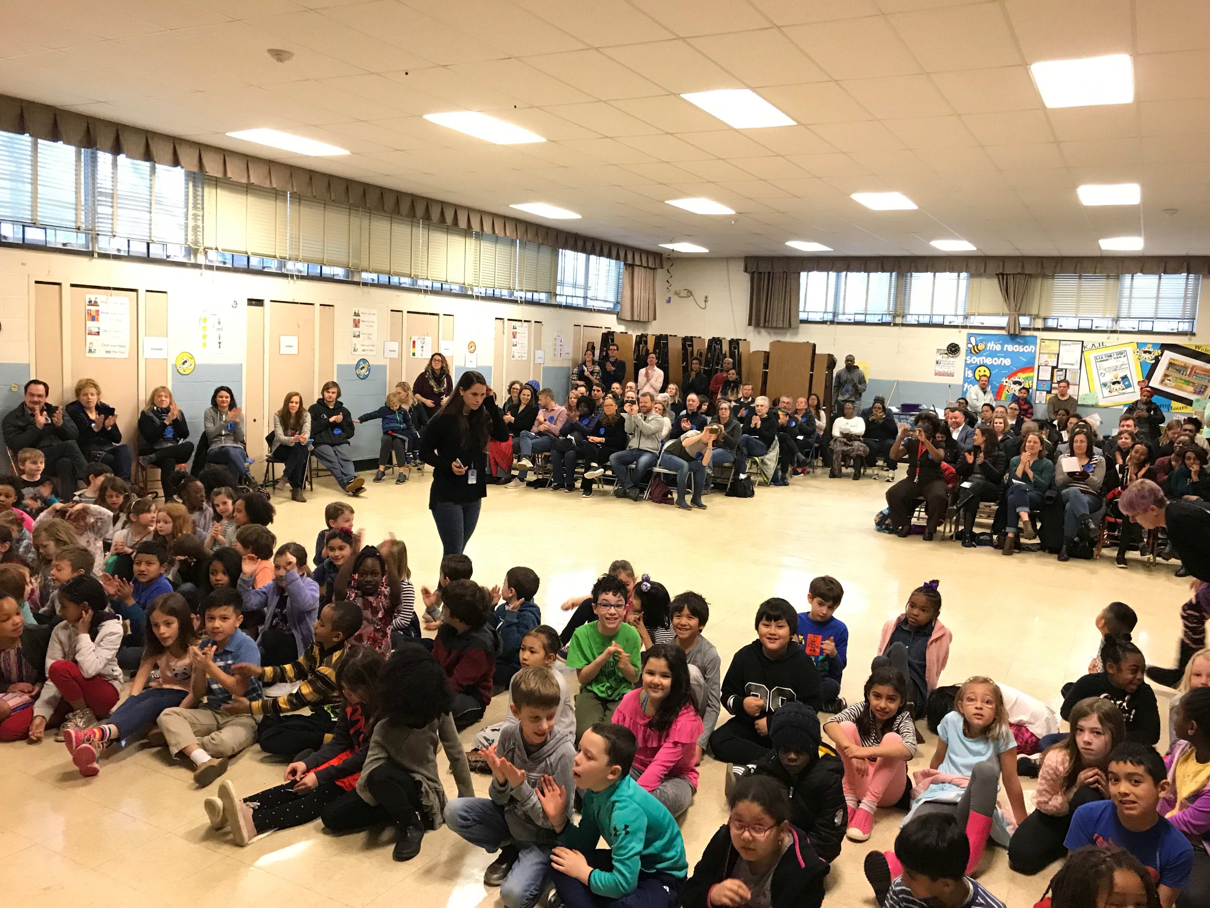 Parents enjoy second graders' original music.